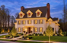 Design rendering: Colonial home with Christmas wreaths on three dormers